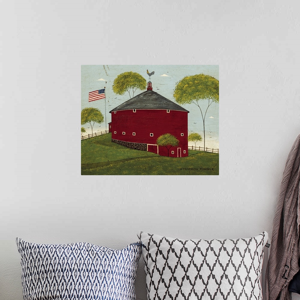 A bohemian room featuring Horizontal, folk art painting on a big wall hanging of a red, round barn on a hillside, surrounde...