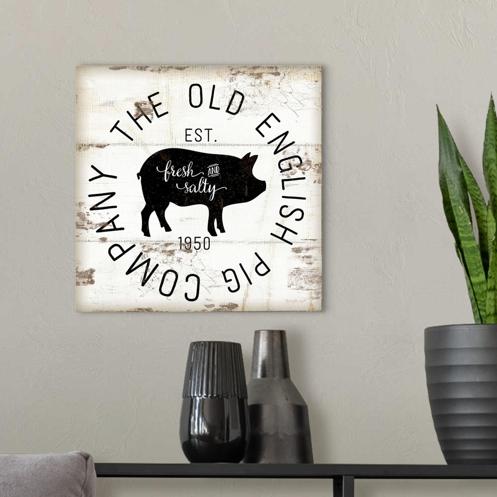 A modern room featuring A digital illustration of "The Old Pig Company" on a white shiplap background.
