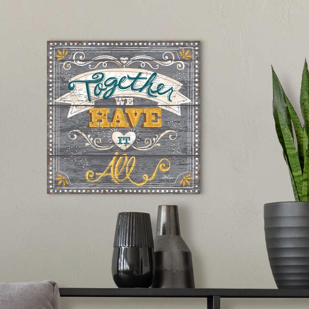 A modern room featuring Font-driven sign art conveys a wonderful sentiment about love and home, "Together We Have it All"