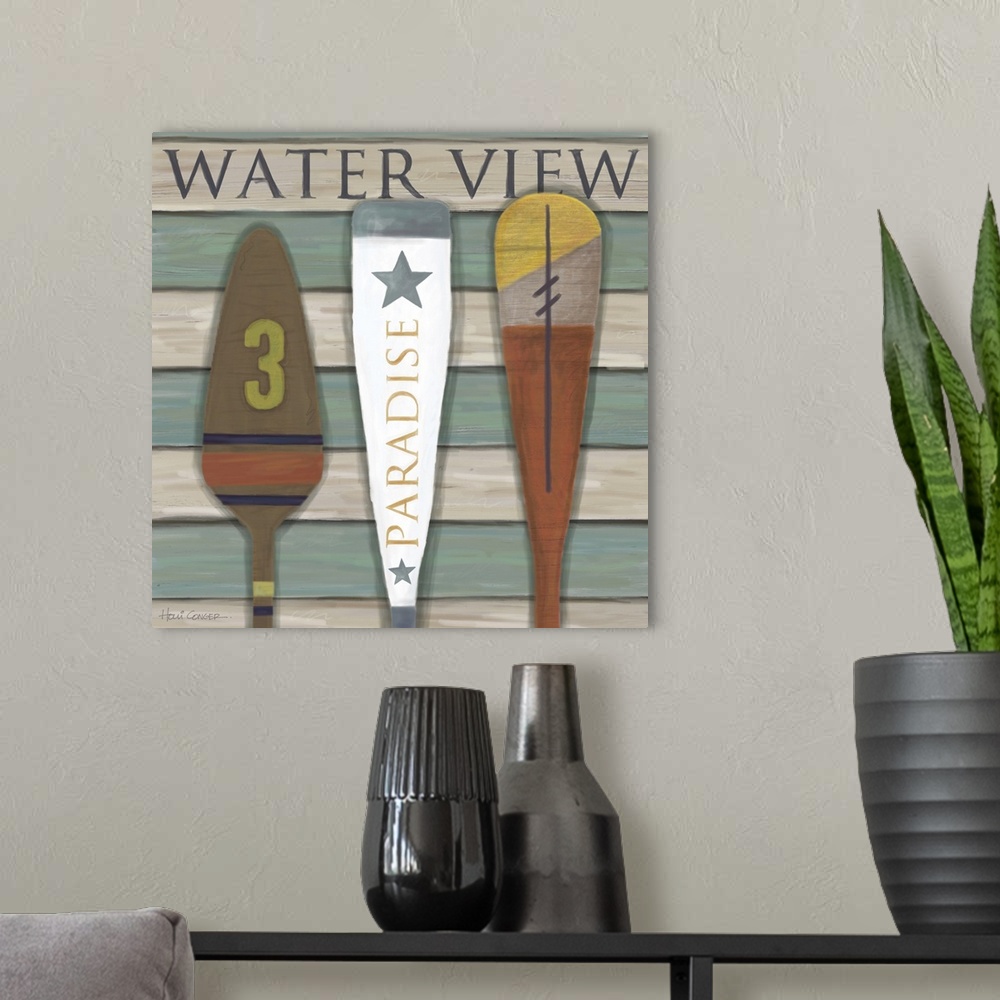 A modern room featuring Boat oars are a decorative array for the wall.