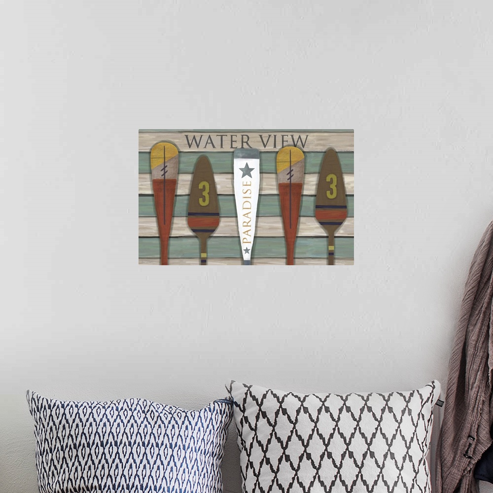 A bohemian room featuring Boat oars are a decorative array for the wall.