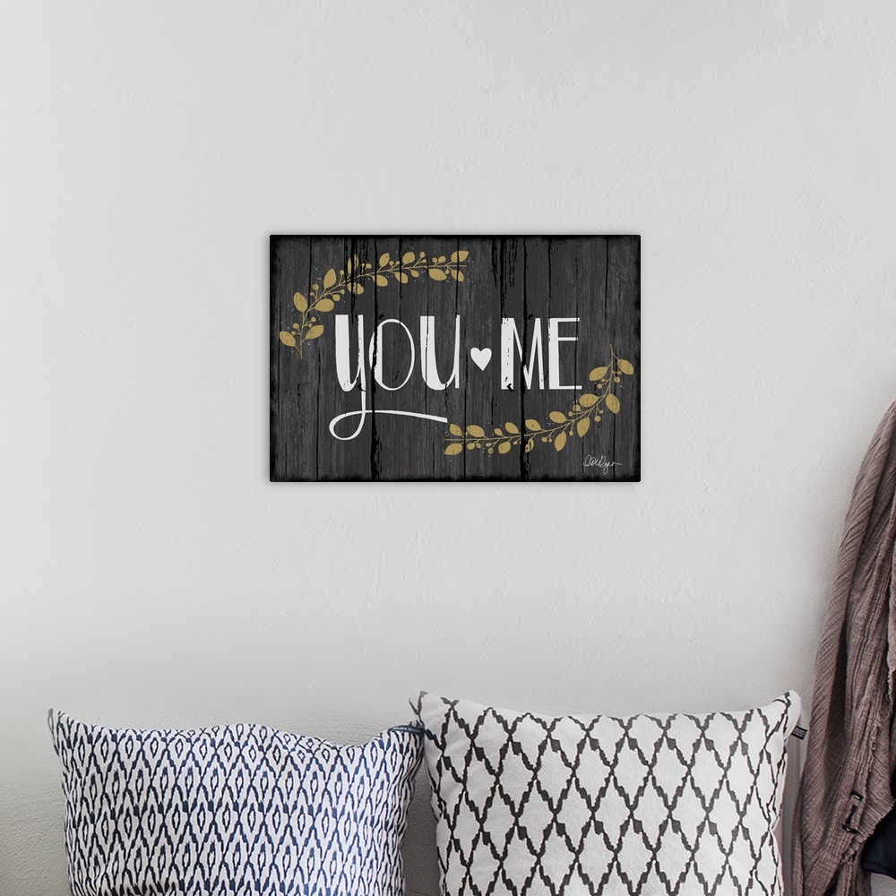 A bohemian room featuring Font-driven sign art conveys a wonderful sentiment about love and home, "You and Me"