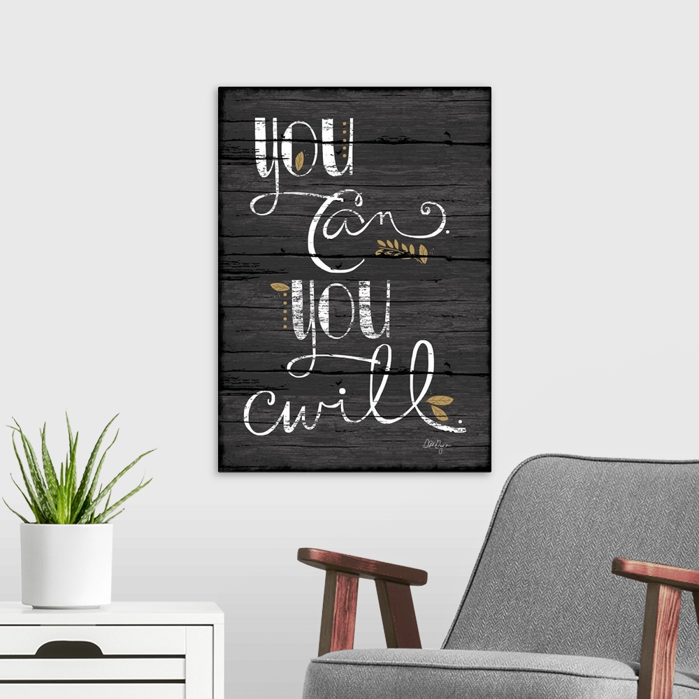 A modern room featuring Font-driven art, neutral colors and a great message!