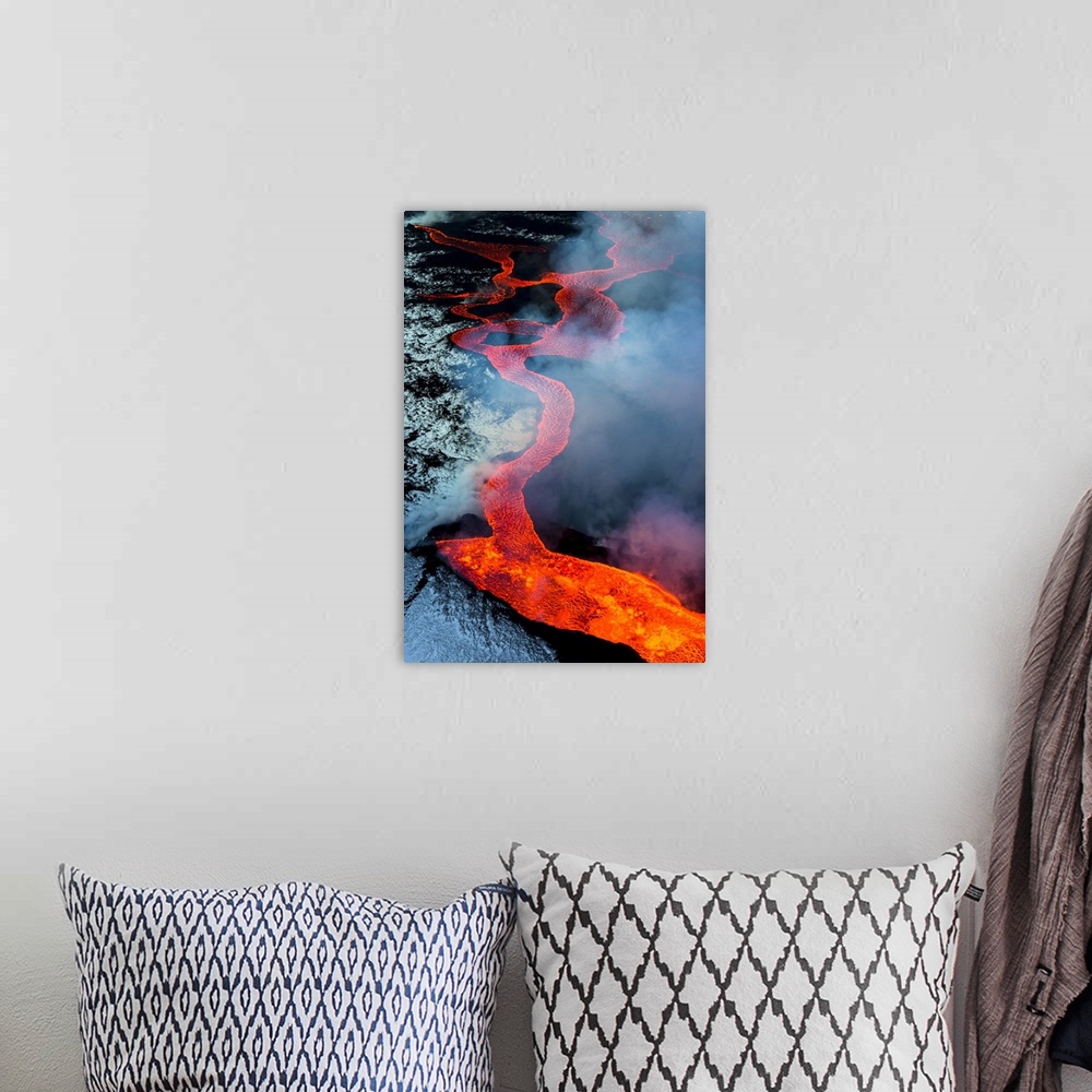 A bohemian room featuring 2014 eruption of Bararbunga, Iceland.