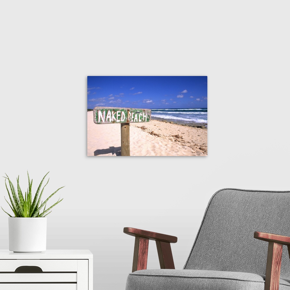A modern room featuring Abstract of naked beach sign in Cozumel Mexico.