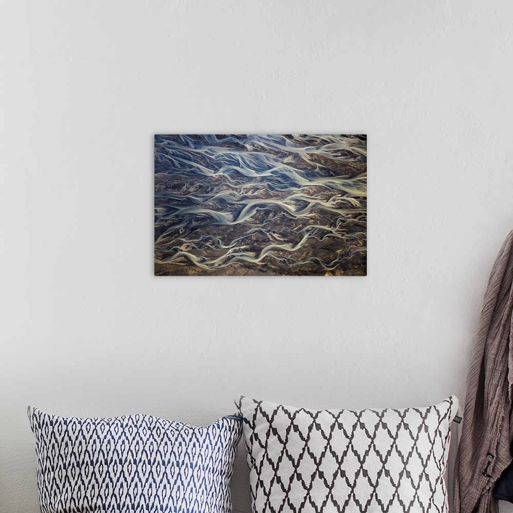A bohemian room featuring Aerial of braided rivers, Iceland.