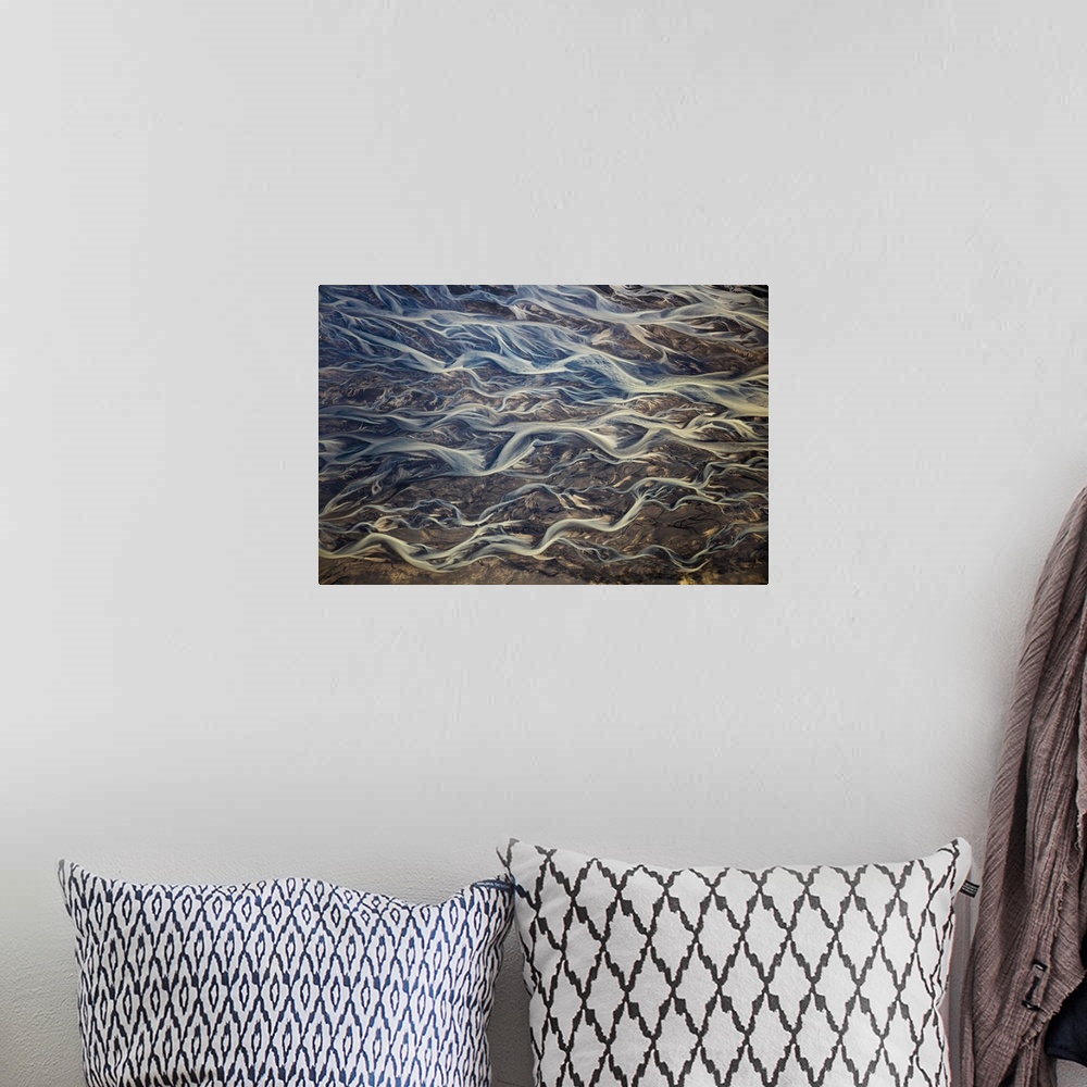 A bohemian room featuring Aerial of braided rivers, Iceland.