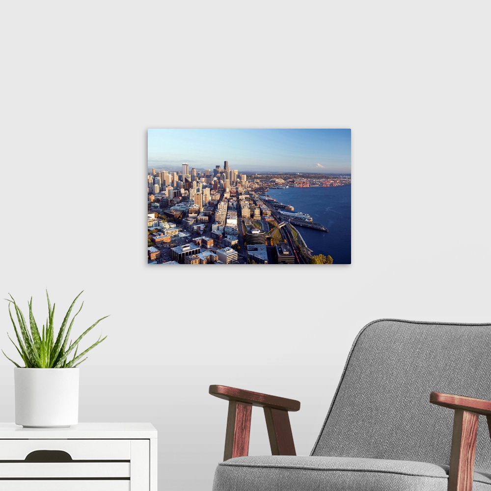 A modern room featuring Aerial view of downtown Seattle and Elliott Bay, Seattle, Washington.