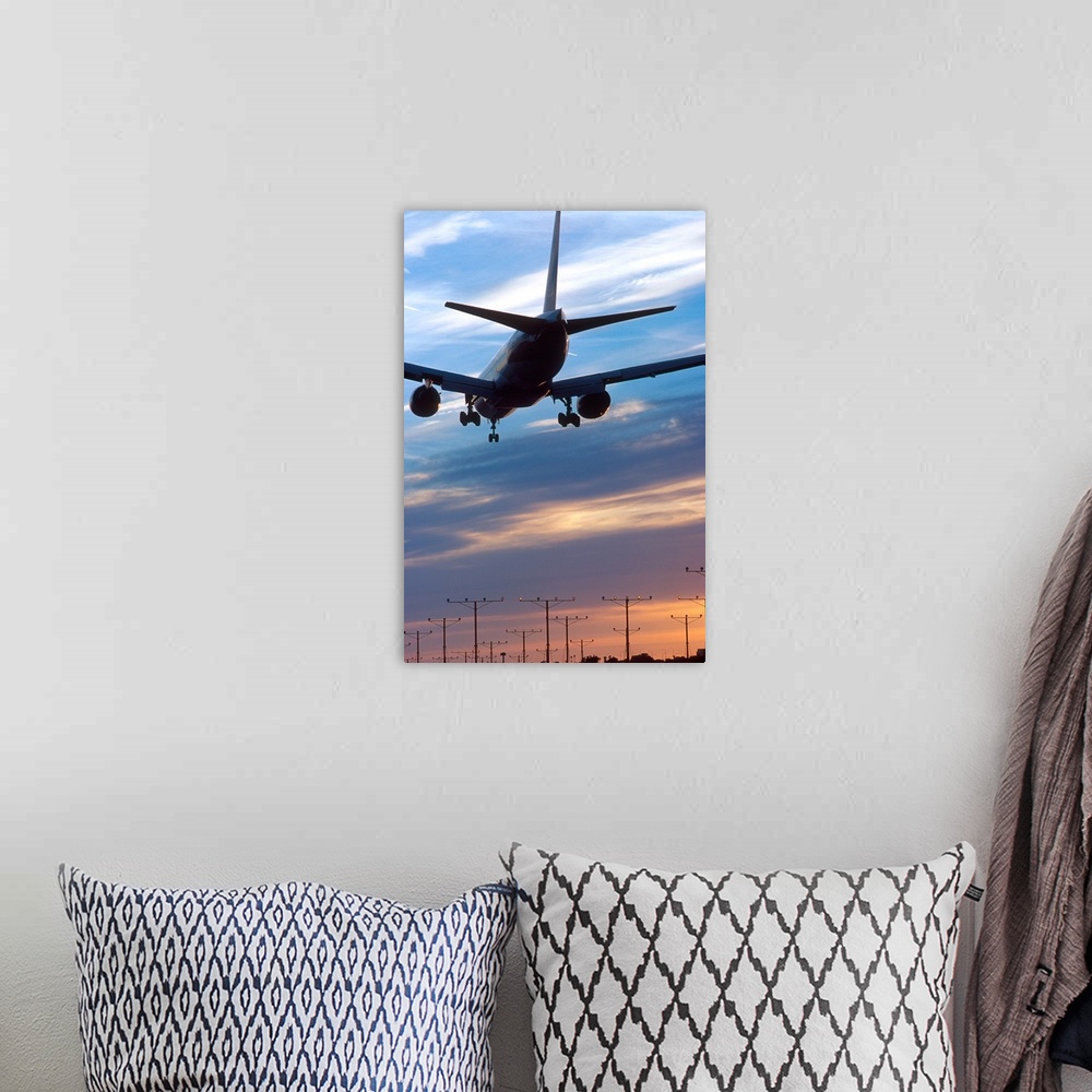 A bohemian room featuring Airplane landing at LAX airport in Los Angeles, California at sunset.