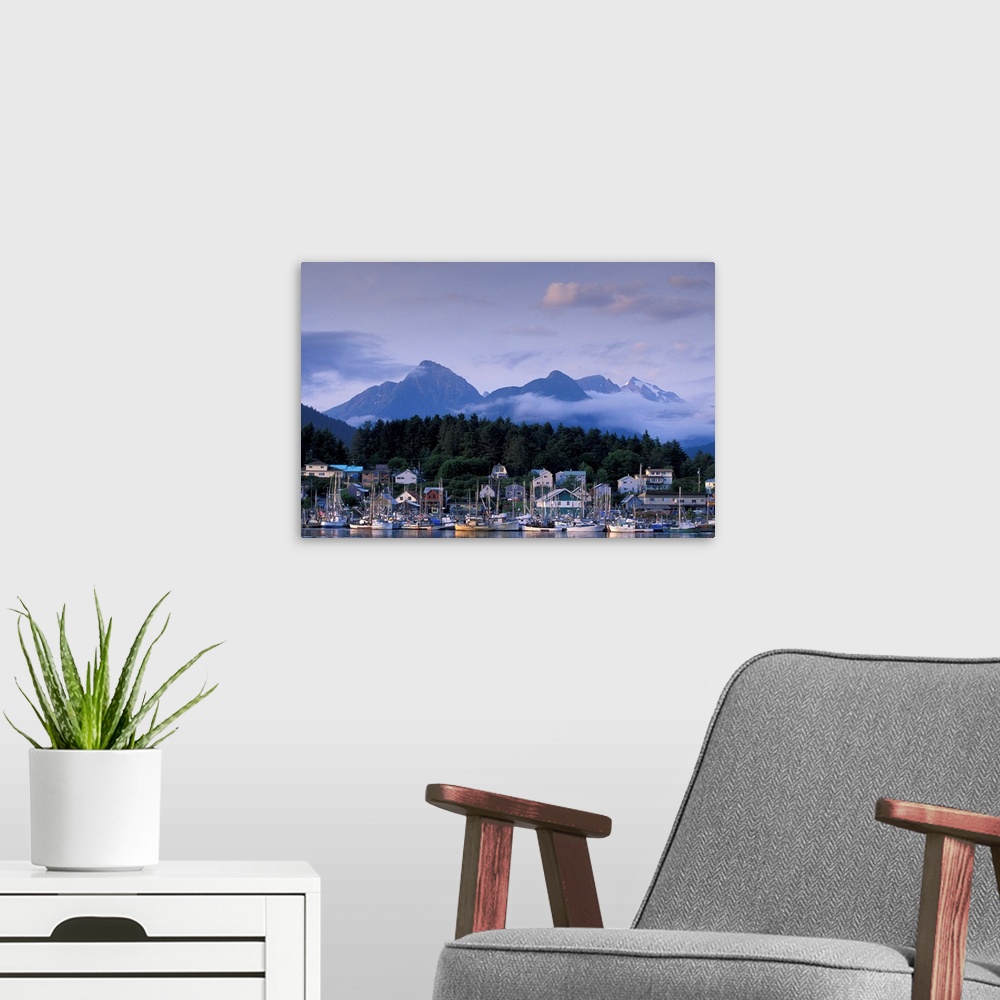 A modern room featuring USA, Alaska, Sitka, part of the Sitka fishing fleet tied up, mountains of Baranof Island behind.