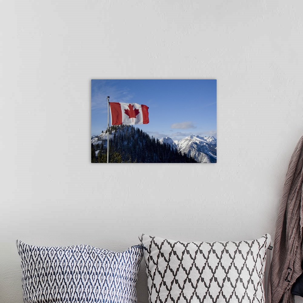 A bohemian room featuring Canada, Alberta, Banff. Mountain views with Canadian flag on the summit of Sulphur Mountain.