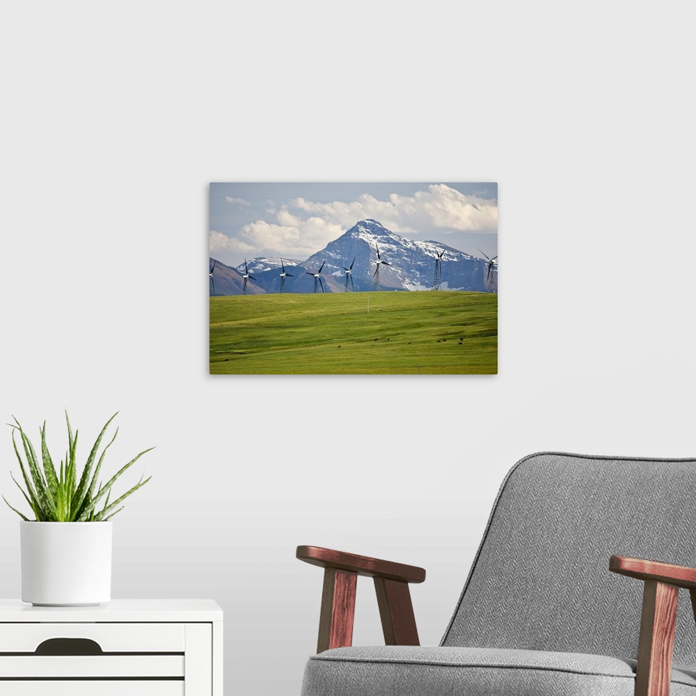 A modern room featuring North America, Canada, Alberta, Rocky Mountains south of PIncher Creek, wind turbines and wind fa...