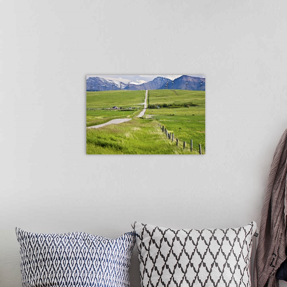 A bohemian room featuring North America, Canada, Alberta, Rocky Mountains south of PIncher Creek, wind turbines and wind fa...