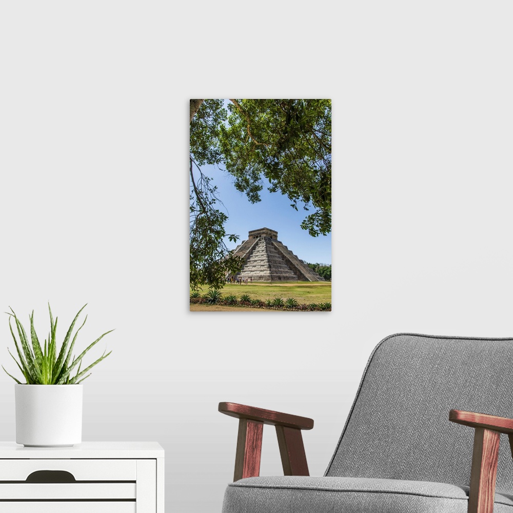 A modern room featuring Ancient step pyramid Kukulkan at Chichen Itza Mexico.