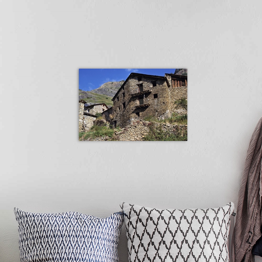 A bohemian room featuring Europe, Andorra. Crumbling stone walls dot the hillsides in Andorra.