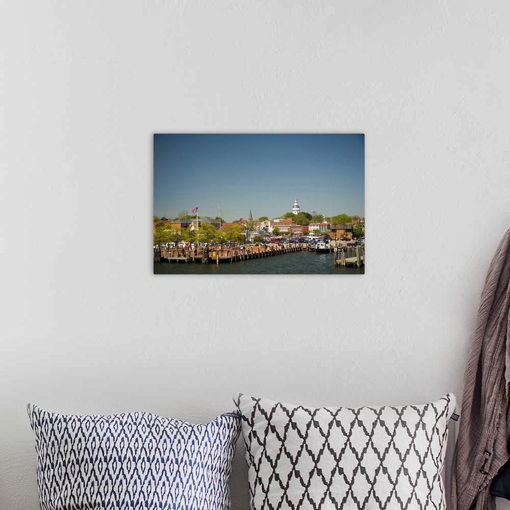 A bohemian room featuring Annapolis city docks, viewed from mouth of Severn River, historic State Capitol Building in dista...