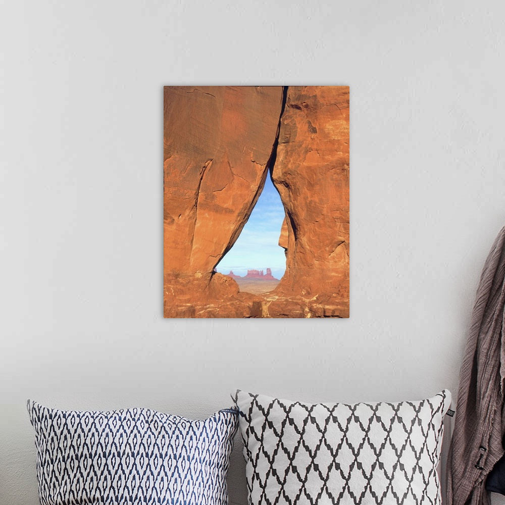 A bohemian room featuring USA, Arizona. View of formations through famous Teardrop Window through rock face in Monument Val...