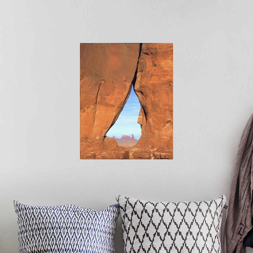 A bohemian room featuring USA, Arizona. View of formations through famous Teardrop Window through rock face in Monument Val...