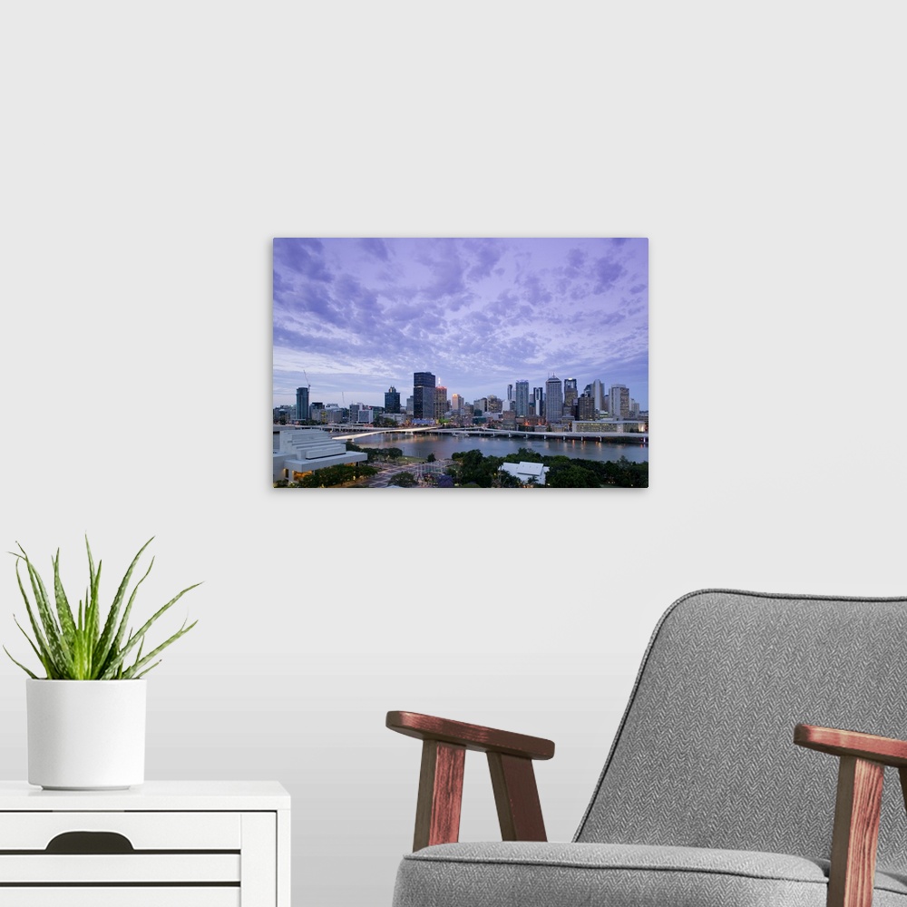 A modern room featuring AUSTRALIA, Queensland, Brisbane. City Skyline from Southbank / Evening.