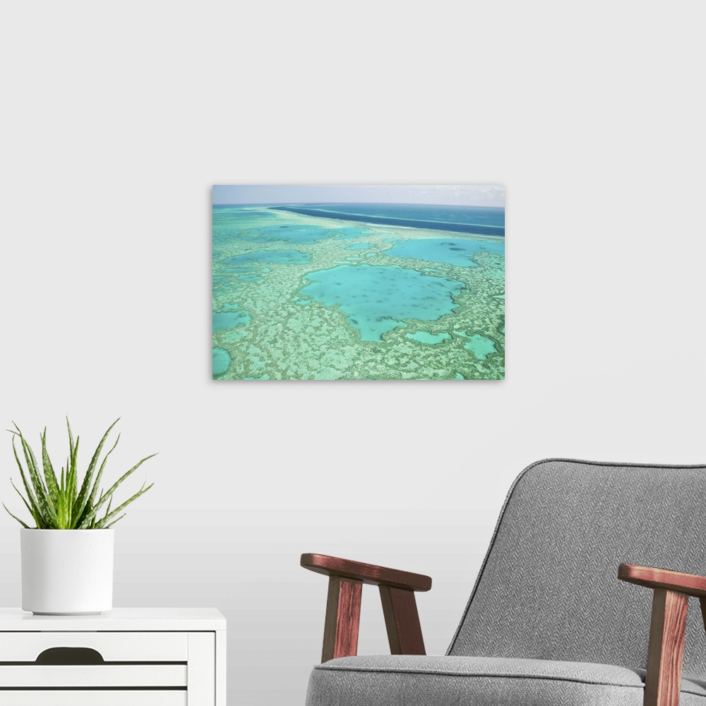 A modern room featuring AUSTRALIA, Queensland, Whitsunday Coast, Great Barrier Reef. Aerial of the Great Barrier Reef by ...