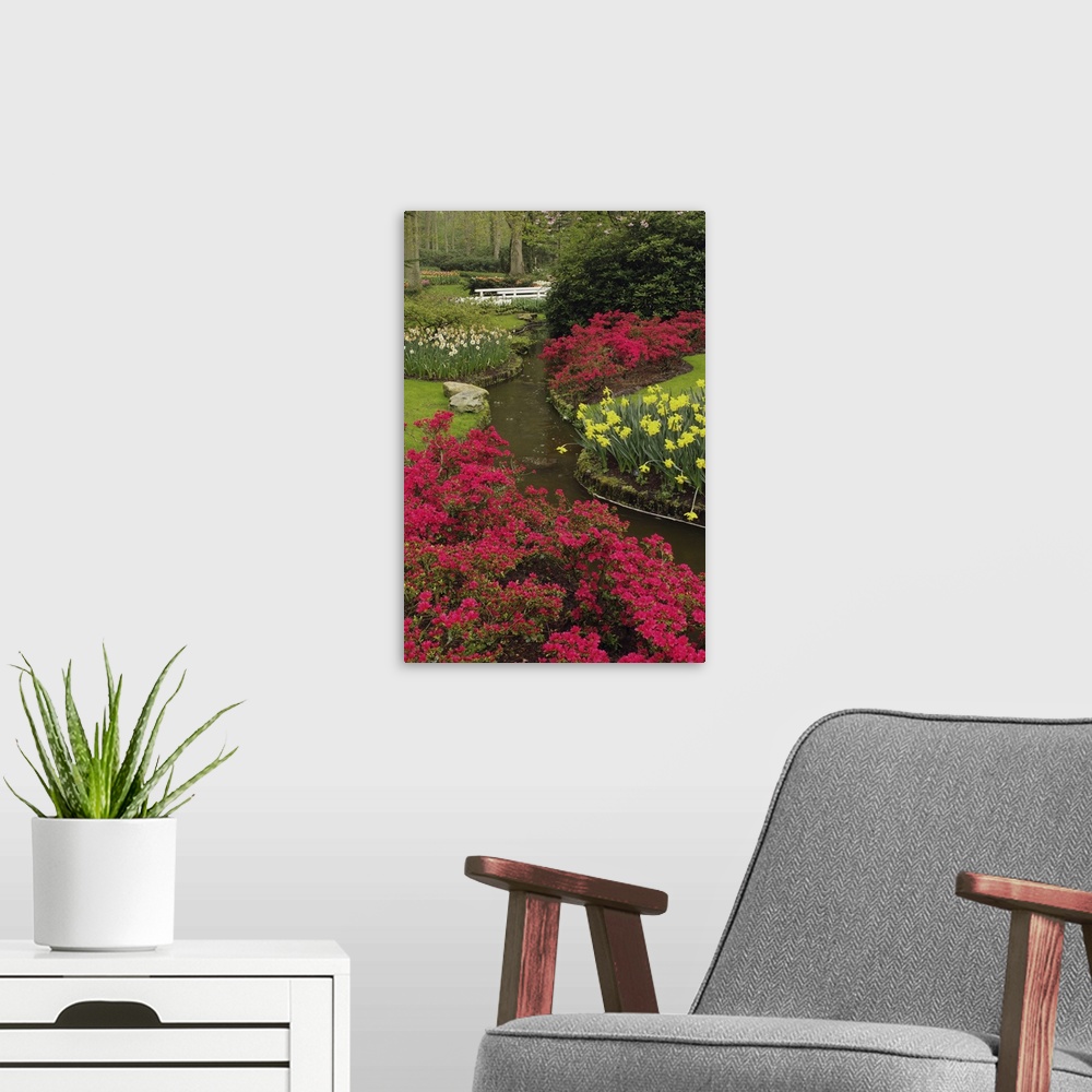 A modern room featuring Azalea and daffodil garden, Keukenhof Gardens; Lisse; Netherlands, Holland