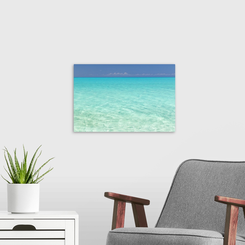 A modern room featuring Bahamas, Little Exuma Island. Seascape of aqua ocean water.