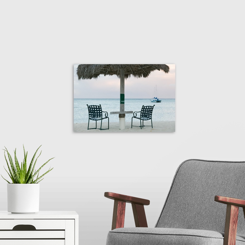 A modern room featuring ABC Islands-ARUBA-Palm Beach:.Beach Chairs / Morning