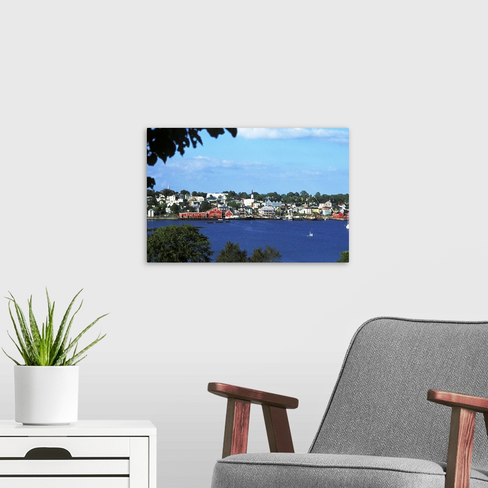 A modern room featuring Beautiful scenic of village harbor at Lunenburg in Nova Scotia, Canada.