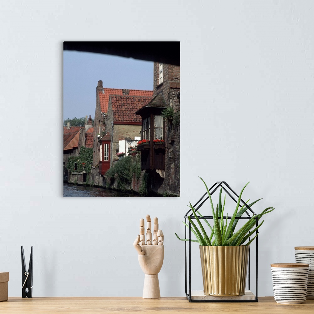 A bohemian room featuring Europe, Belgium, Bruges.Houses on river