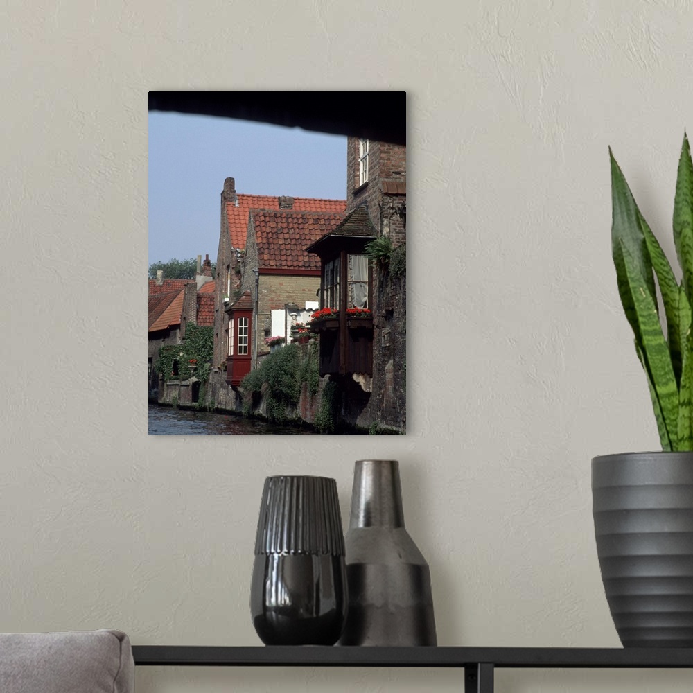 A modern room featuring Europe, Belgium, Bruges.Houses on river