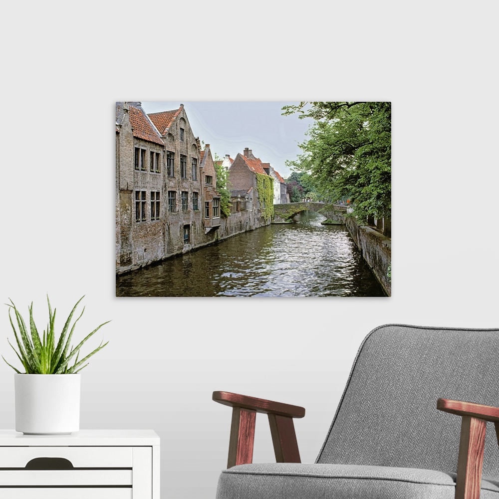 A modern room featuring Europe, Belgium, Brugge. Old stone homes line the canals in Brugge, a World Heritage Site, Belgium.