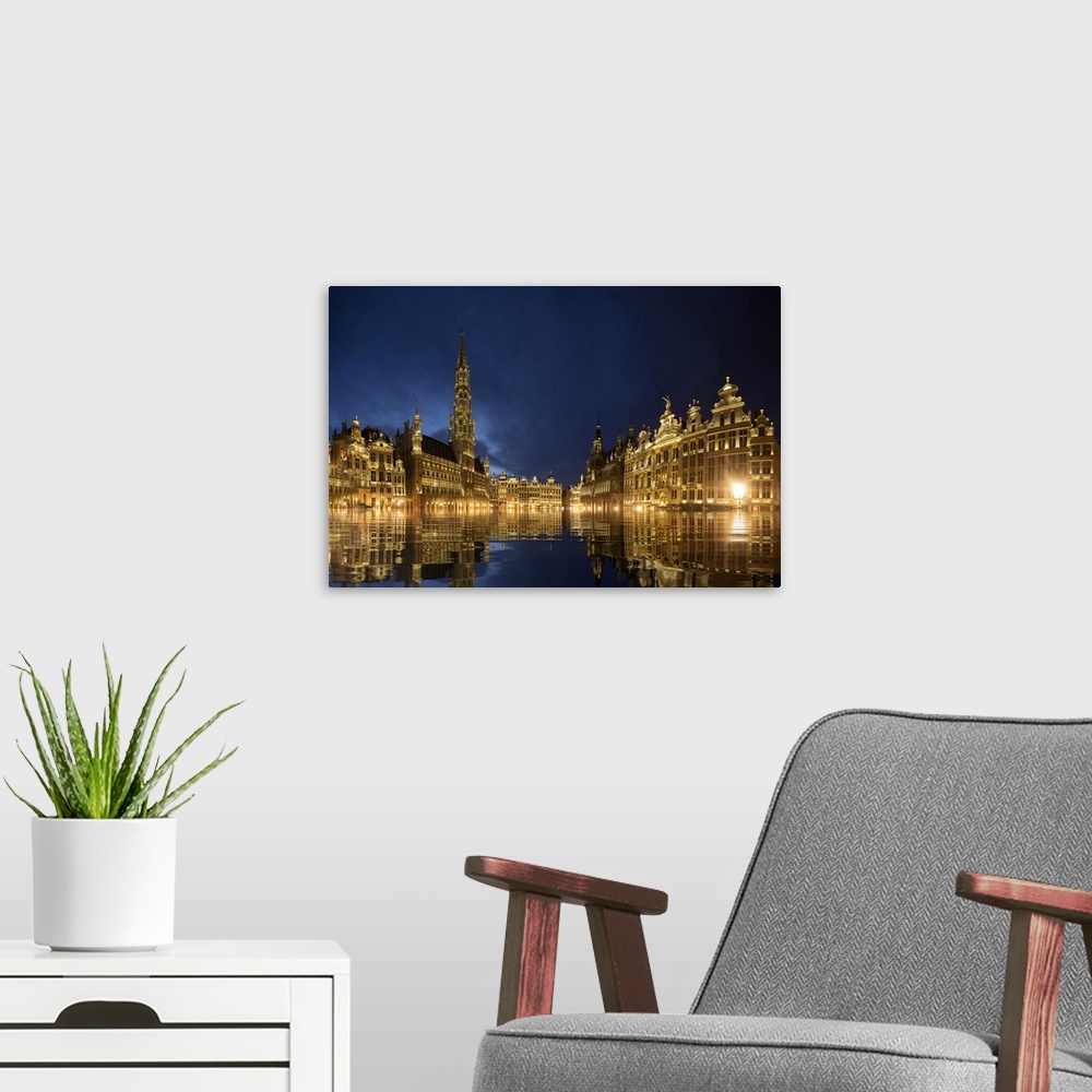 A modern room featuring Belgium, Brussels. Grand Place main square lit at twilight.