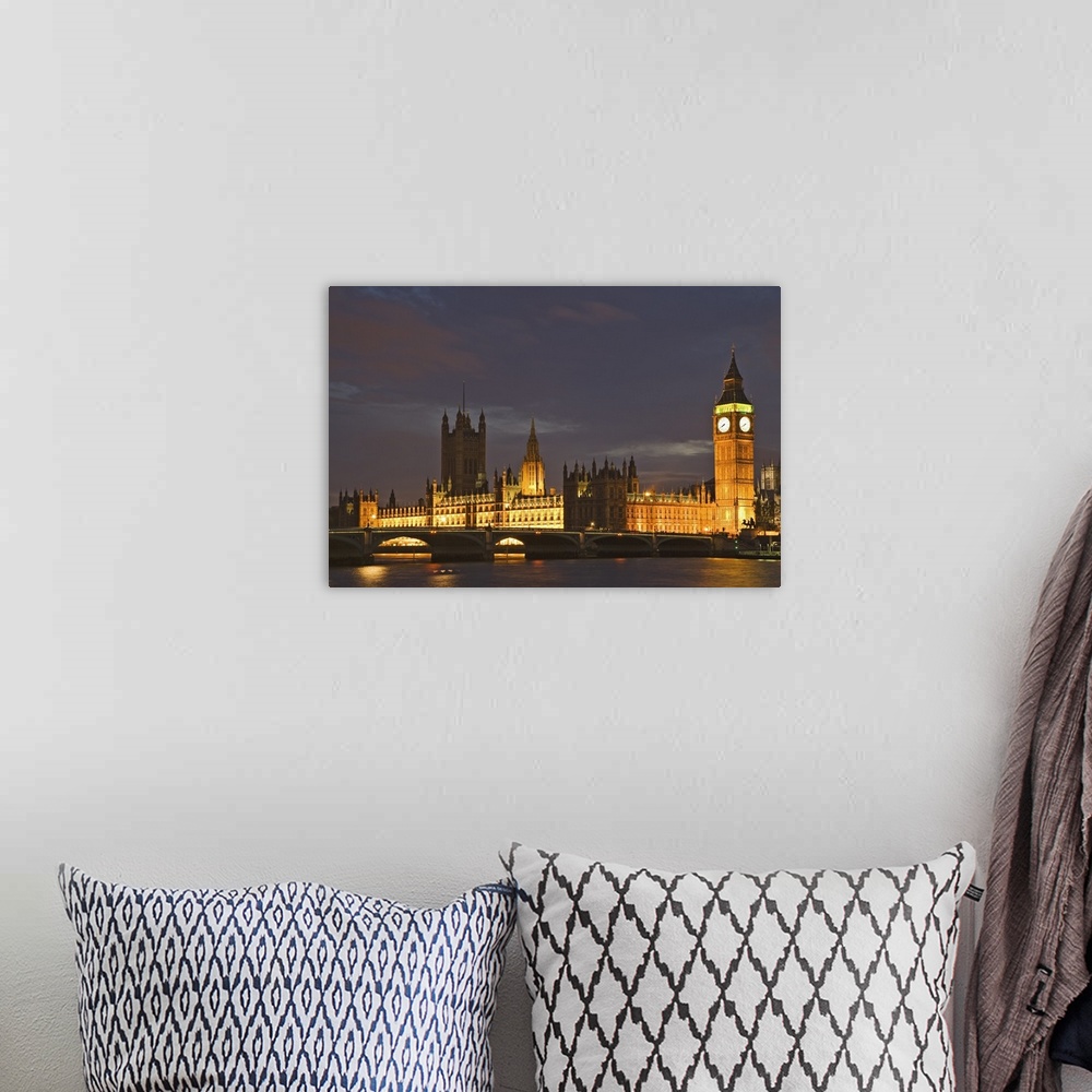 A bohemian room featuring Europe, Great Britain, London. Big Ben and the Houses of Parliament are illuminated at night. Cre...