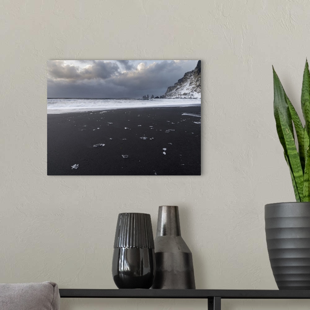 A modern room featuring Coast near Vik i Myrdal during winter. Black volcanic beach with the Reynisdrangar sea stacks, Ic...