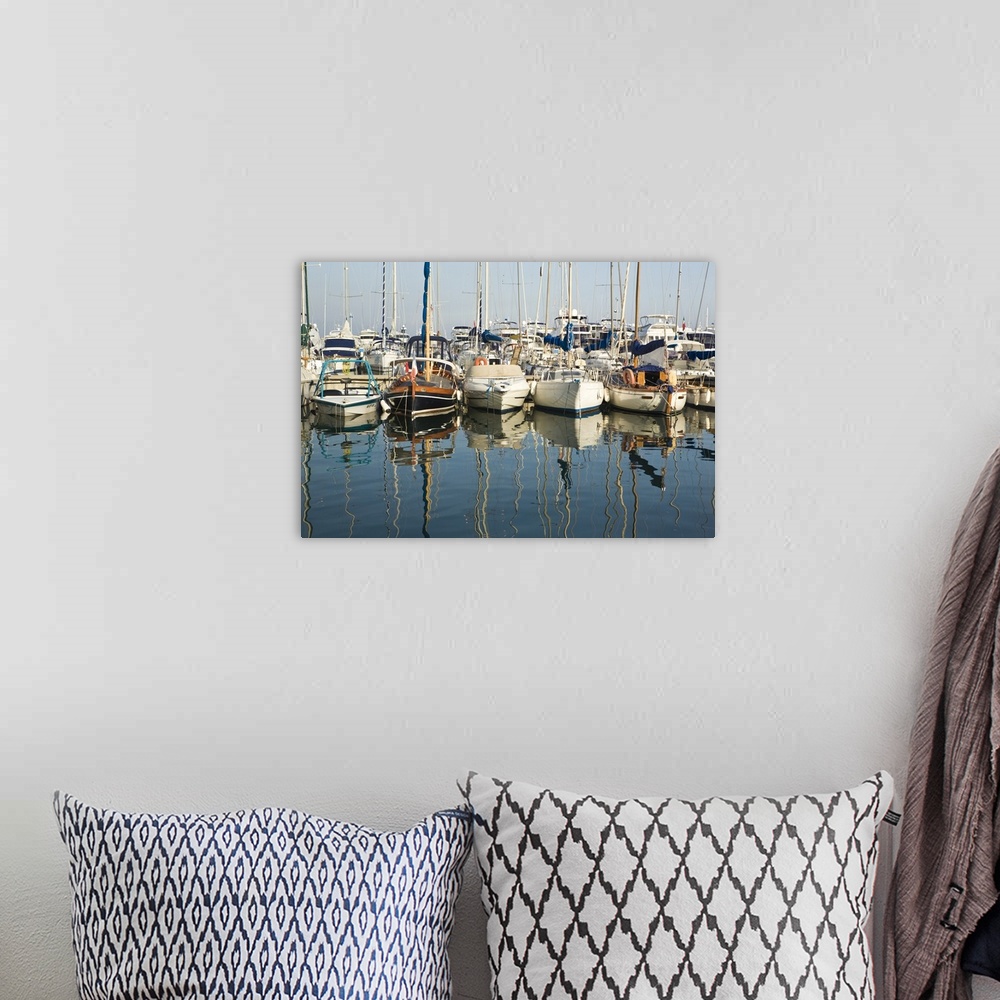 A bohemian room featuring Boats and reflections in the marina area of Beaulieu sur Mer.  on the coastline in the South of F...