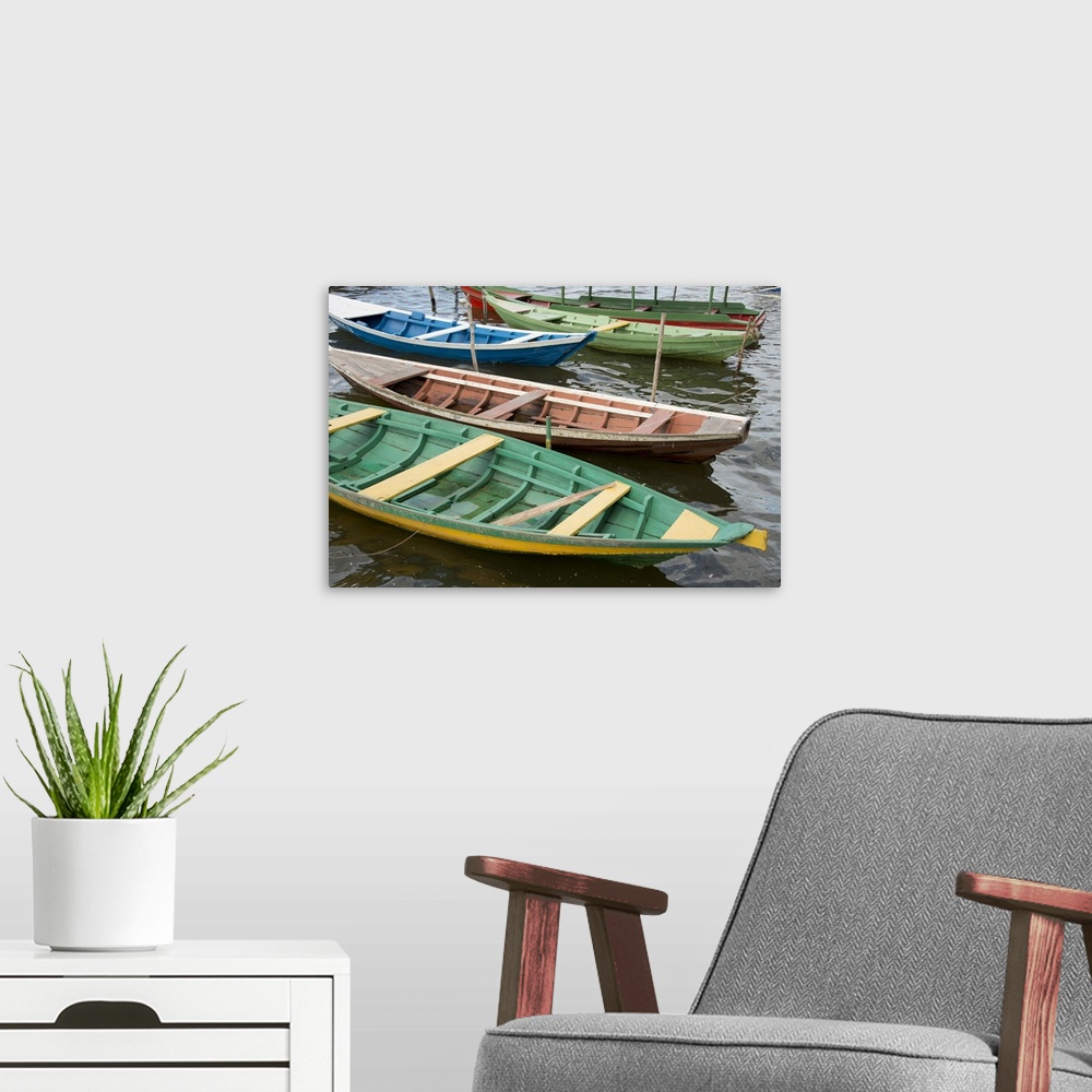 A modern room featuring Brazil, Amazon, Alter Do Chao, colorful local wooden fishing boats.