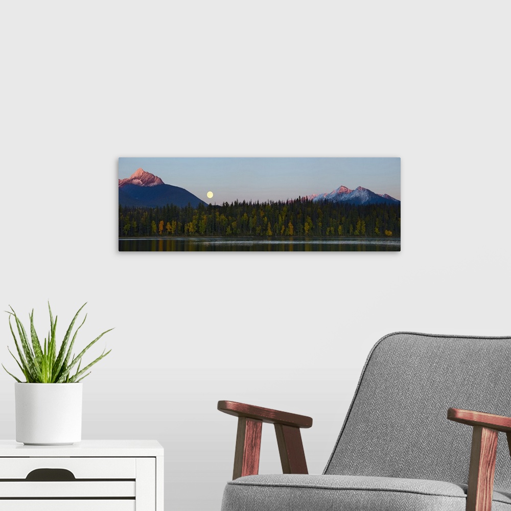 A modern room featuring Canada, British Columbia, Bowron Lakes Provincial Park. Panorama of autumn color on Unna Lake, wi...