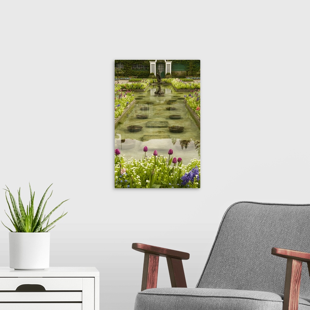 A modern room featuring North America, Canada, British Columbia, Butchart Gardens.  Formal reflecting pool surrounded by ...