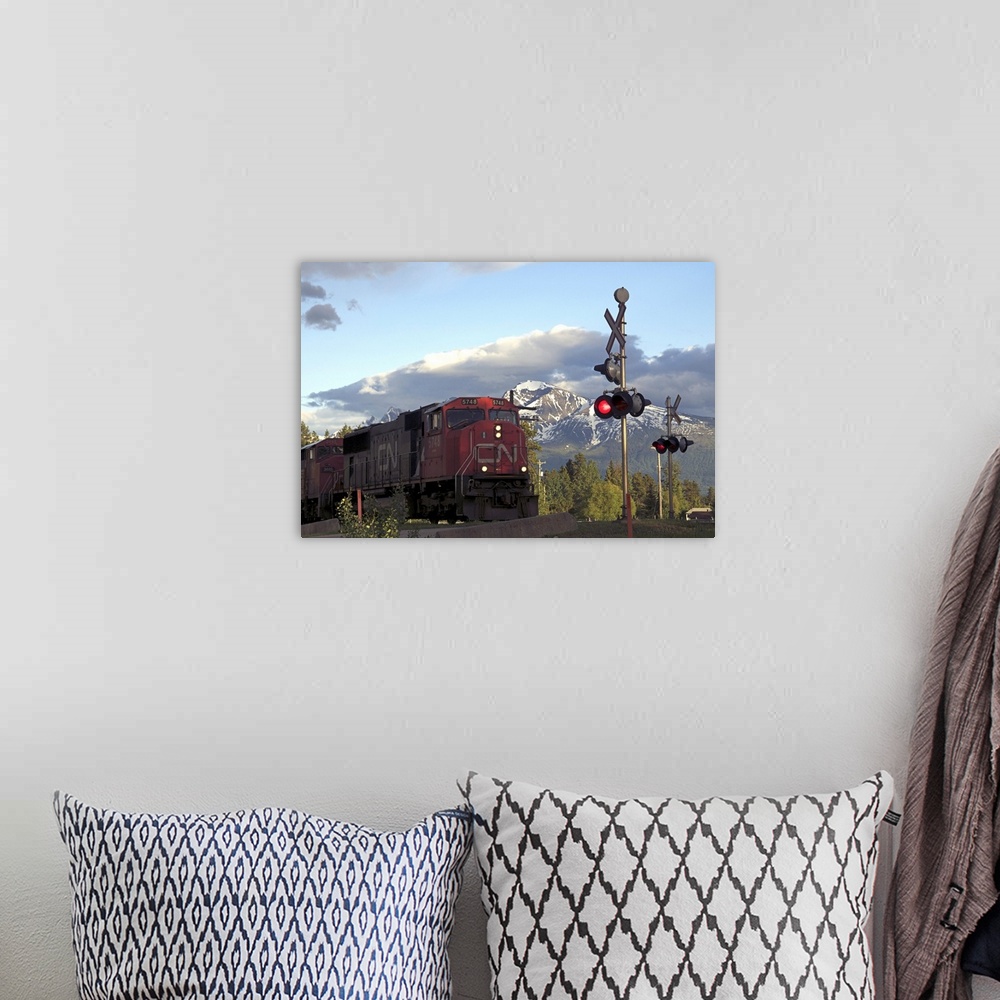 A bohemian room featuring Canada:  British Columbia, Valemount, train tracks and light in front of Canoe Mountain