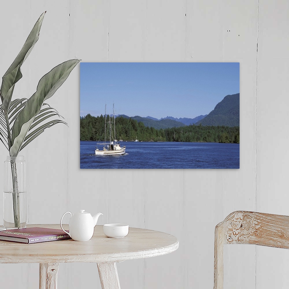 A farmhouse room featuring Canada, British Columbia, Vancouver Island.Fishing boat from Tofino harbor into Clayoquot Sound