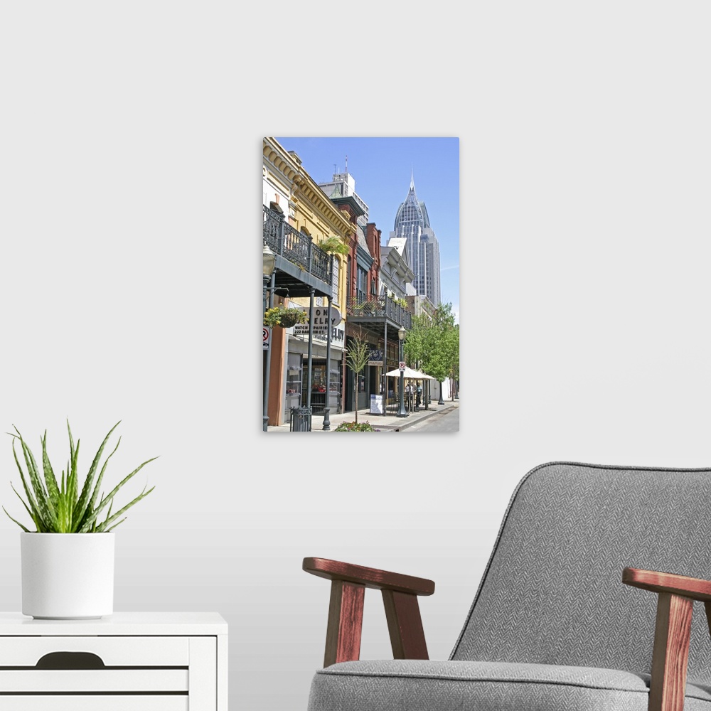 A modern room featuring Businesses historic buildings on Dauphin Street, downtown Mobile, Alabama.