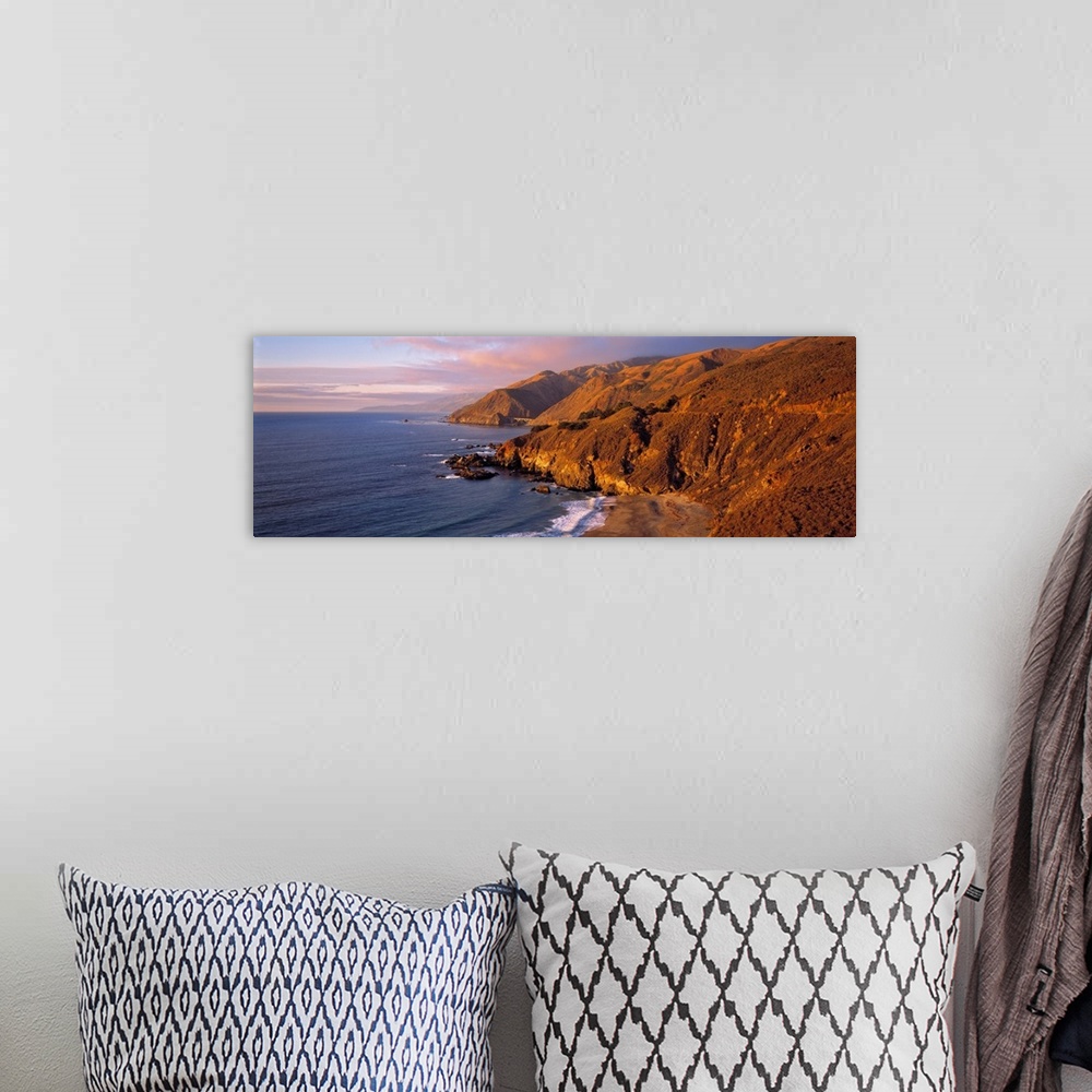 A bohemian room featuring USA, California, Big Sur. Sunset casts a golden hue over the Coast Range near Big Sur, on Highway...