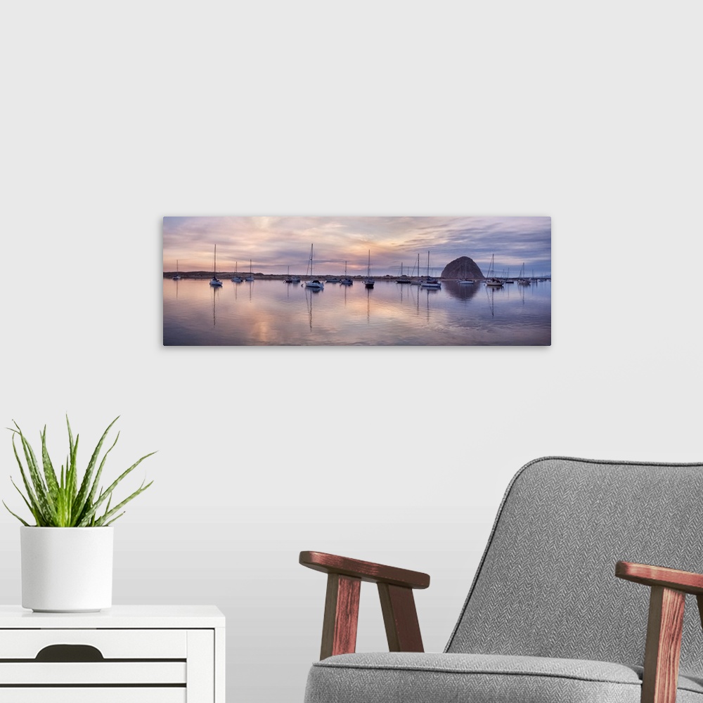 A modern room featuring USA, California, Panoramic view of sailboats moored in Morro Bay at sunset