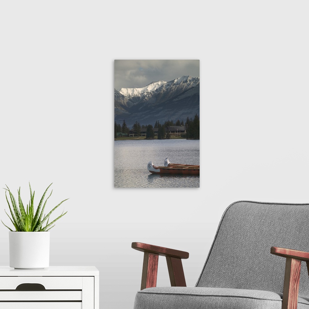 A modern room featuring Canada, Alberta, Jasper National Park, Lake Beauvert Indian Canoes