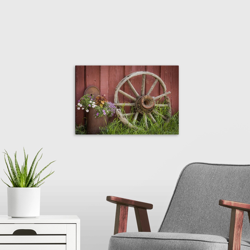 A modern room featuring Canada, British Columbia, Cache Creek, Hat Creek Ranch. Vintage wagon wheel and flowers.