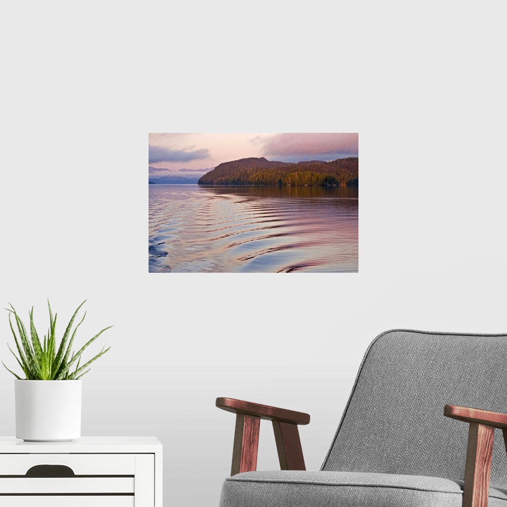 A modern room featuring Canada, British Columbia, Calvert Island. Boat wake in water at sunset. Credit as: Don Paulson / ...