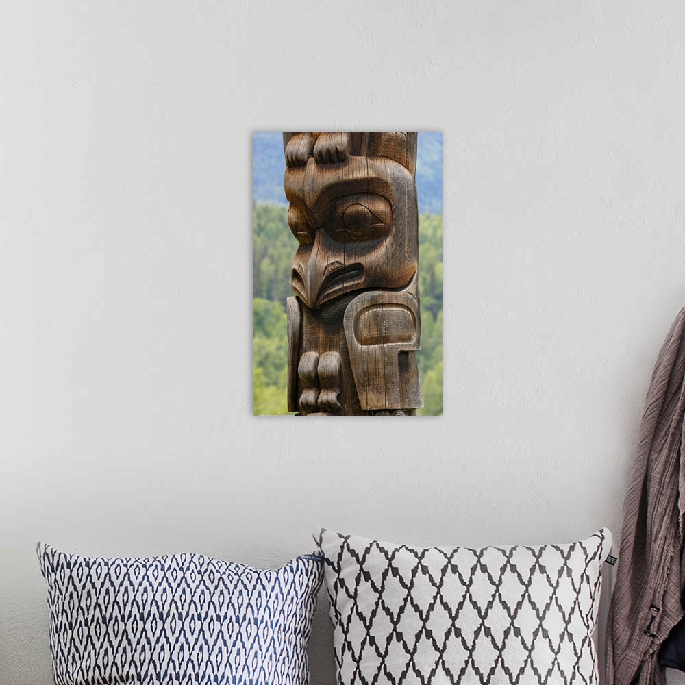 A bohemian room featuring Canada, British Columbia, Kispiox. Detail of totem pole.
