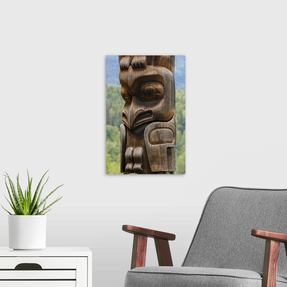 A modern room featuring Canada, British Columbia, Kispiox. Detail of totem pole.