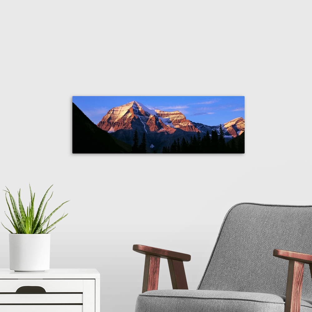 A modern room featuring Canada, British Columbia, Mt Robson. The striation on Mount Robson, a World Heritage Site, is acc...