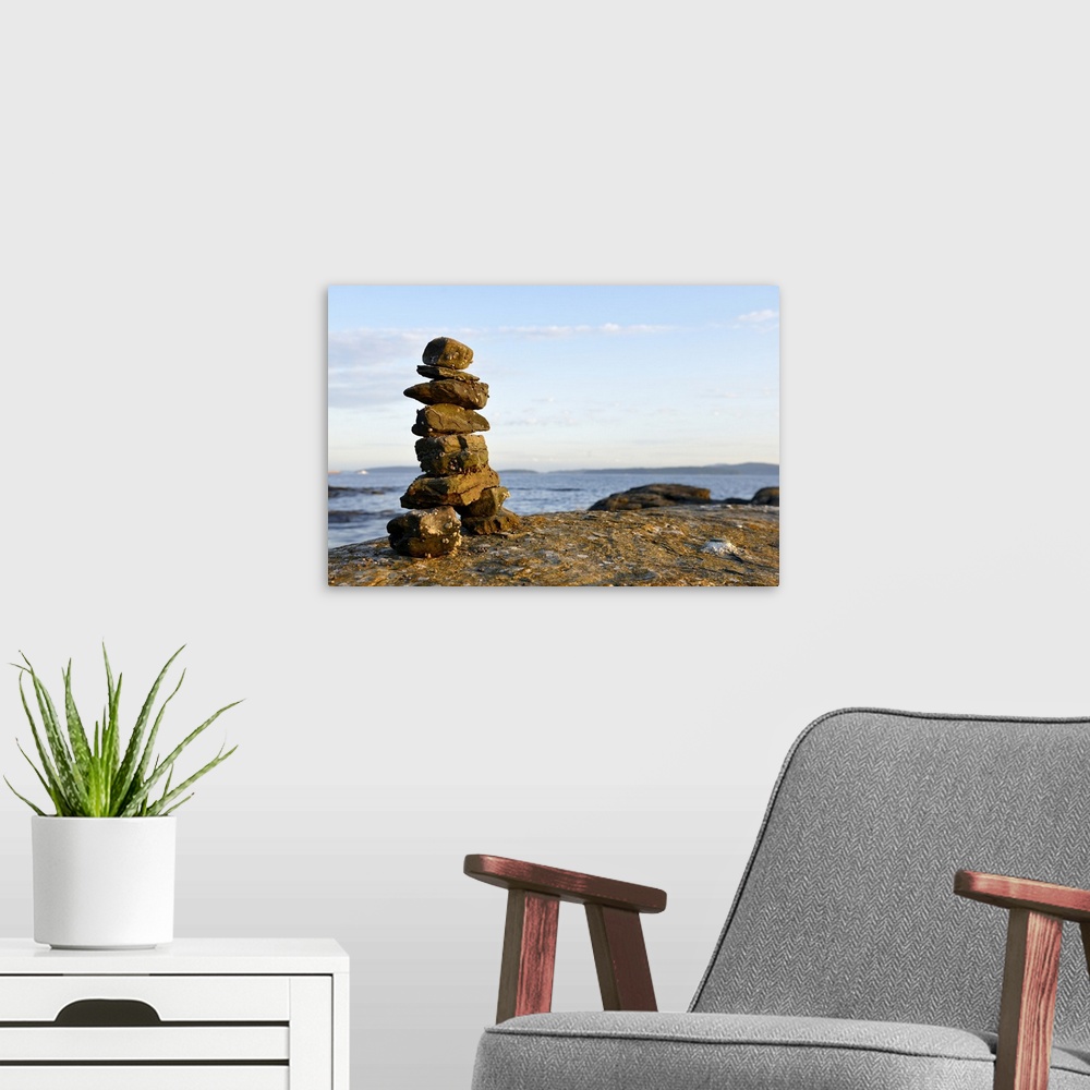 A modern room featuring Canada, British Columbia, Russell Island. Rock inukshuk in front of Salt Spring Island.